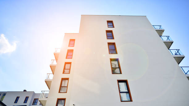 istock Modern luxury residential flat. Modern apartment building on a sunny day. 1396032276