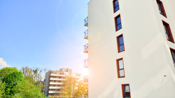 istock Eco architecture. Green tree and apartment building. 1396033422