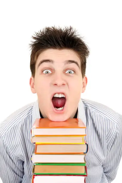 Excited Student with the Books Isolated on the White Background