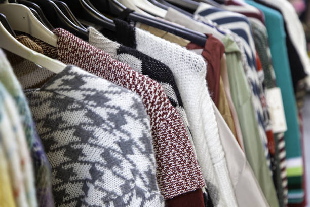 istock Knitted clothes on hangers 1396037691