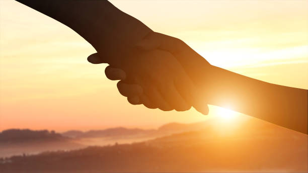istock Silhouette of help and hope concept 1396040568