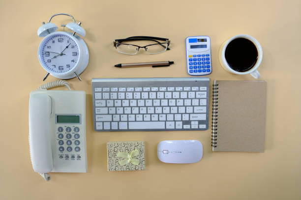 istock Office desk with computer, Pencil, spectacles, and a notebook A cup of coffee on a wood background, Top view with copy space, Make a mock-up. 1396043615