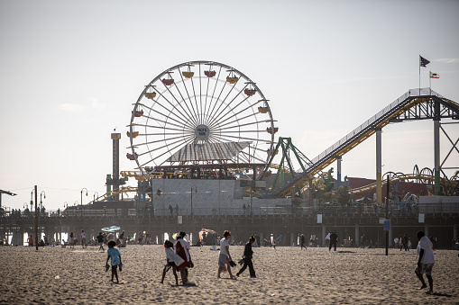 Santa Monica, CA - April 15 2022: The Santa Monica pier with its Ferris wheel