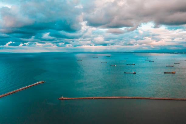 Entrance to port. Lighthouse in port of Samsun.  Fog over sea.