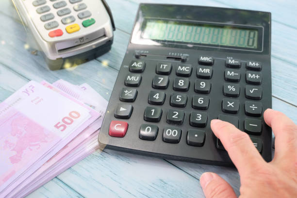 istock Pay with a credit card swiped through the terminal. Customers can pay by EDC or swiping machine. purchase and sale of a product or service 1396045575