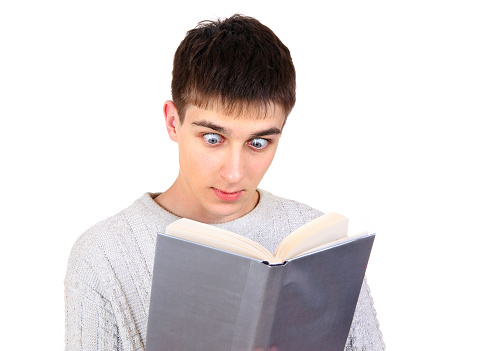 Surprised Young Man with a Book on the White Background