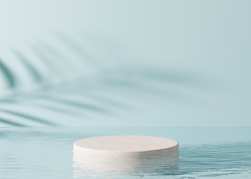 Podium standing in water, with palm shadow, on the blue background. Beautiful mock up for product, cosmetic presentation. Pedestal or platform for beauty products. Empty scene, stage. 3D rendering.