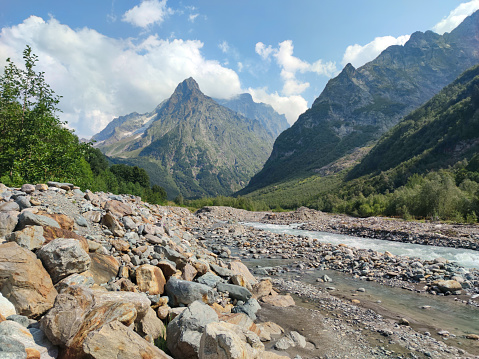 Summer View of Dombay Mountains and valley travel in Russia