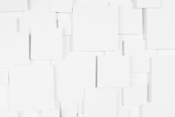 istock Geometric abstract background with squares in bright light with soft  shadows as pattern, top view. Futuristic backdrop in minimal style. 1396054948