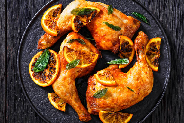 istock Grilled Orange BBQ Chicken legs with sage 1396055011