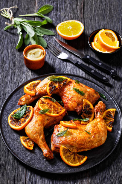 istock Grilled Orange roast Chicken legs with sage 1396055017