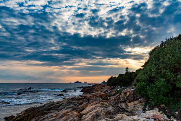 istock Corsican coastline under a threatening sky 1396058287