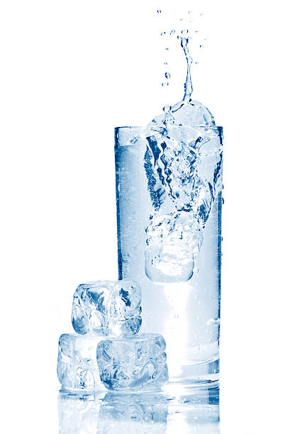istock Water splash in glasse with ice isolated on white 139605938