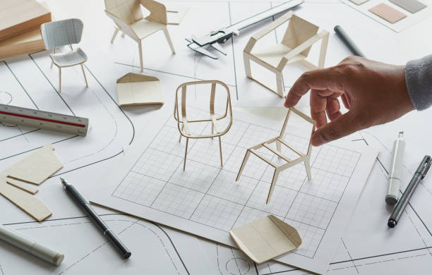 istock Designer sketching drawing design development product plan draft chair armchair Wingback Interior furniture prototype manufacturing production. designer studio concept . 1396063435