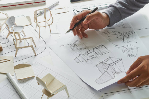 istock Designer sketching drawing design development product plan draft chair armchair Wingback Interior furniture prototype manufacturing production. designer studio concept . 1396063437