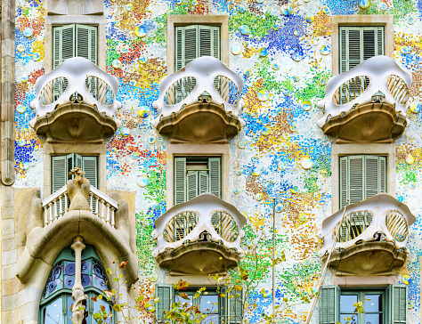 Barcelona, Spain - August 21, 2014: Scenic balconies of Casa Batllo. The amazing building is designed by Antoni Gaudi. Casa Batllo is part of a UNESCO World Heritage Site.