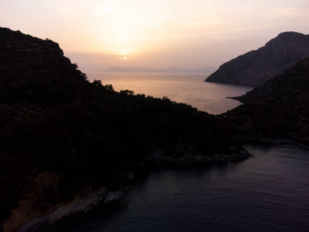 Sunset Behind Mountains stock photo