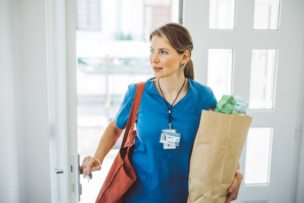 istock Female doctor coming home 1396066566