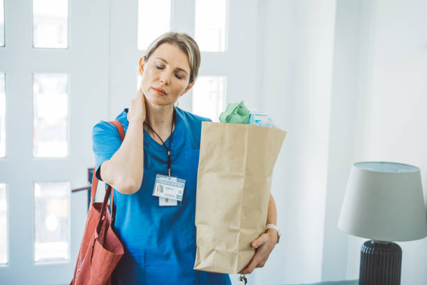 istock Female doctor coming home 1396066583
