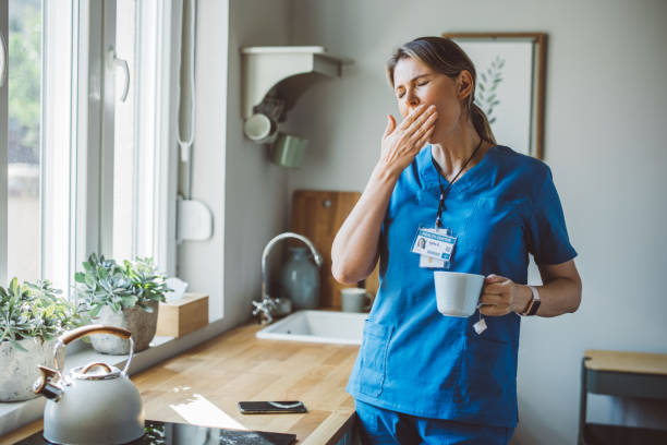 istock Female doctor at home 1396066615