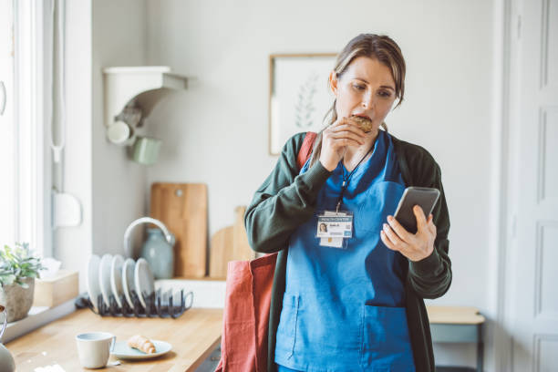 istock Female doctor at home 1396066632