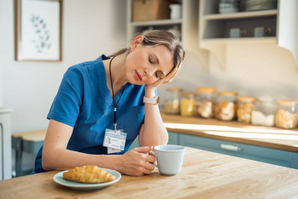 istock Female doctor at home 1396066642