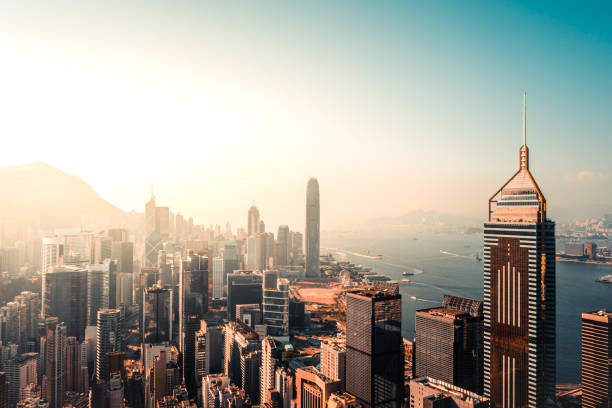 istock Sunset Over Victoria Harbor, Hong Kong 1396067363