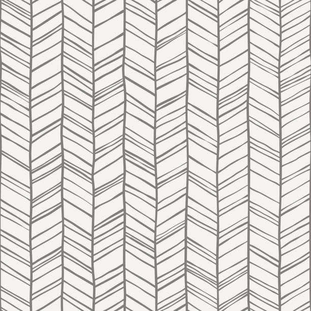 落書きシェブロンシームレスパターン。ヘリンボーンの落書き線を持つベクターの手描きの縞模様の背景。グレーとホワイトの色。 - chevron pattern zigzag doodle点のイラスト素材／クリップアート素材／マンガ素材／アイコン素材
