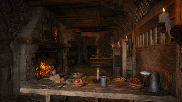 istock Atmospheric medieval tavern interior with dining table lit by window light and open fireplace in the background. 3D illustration. 1396068521