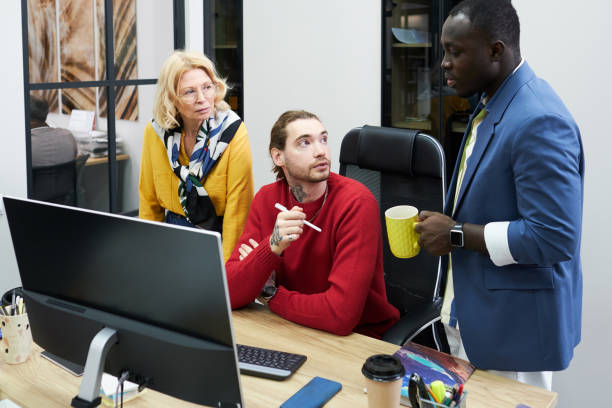 istock Team of graphic designers working over project 1396069720