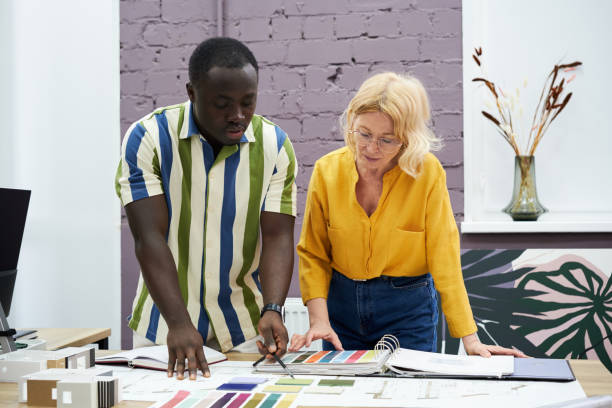 istock Designers discussing the color palette 1396069773