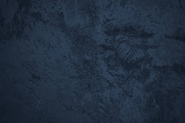 istock Navy blue abstract background. Toned rough concrete wall surface. Dark background. 1396069831