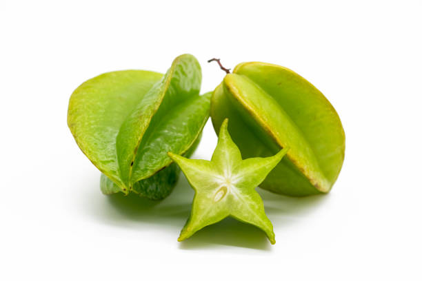istock Fresh whole slices carambolas or Star fruit on white background. 1396070017