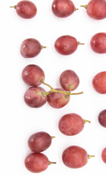 istock Grapes designed isolated on white. With clipping path.top view 1396070693