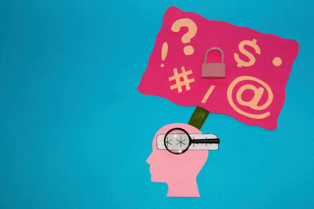 istock pink paper head with code and magnifying glass above a bubble with ideas on how to make the code as strong as possible by inserting characters, internet security 1396071811