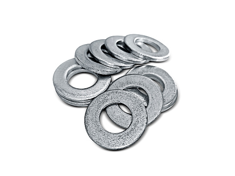 Used old washers and spring washers with isolated white background for commercial