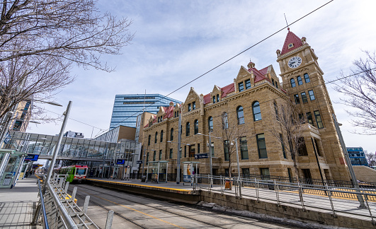 Calgary, AB, Canada - March 14 2022 : CTrain stop at City Hall station. Downtown Calgary.