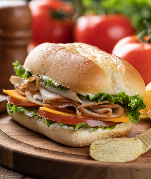 istock Turkey sandwich with lettuce cheese and tomato 1396074958