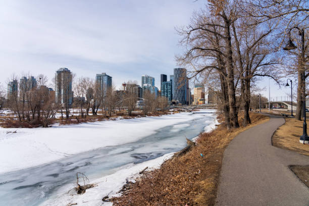 istock Bow River Pathway during winter. Frozen Bow River, St. Patricks Island Park. Downtown Calgary. 1396076848