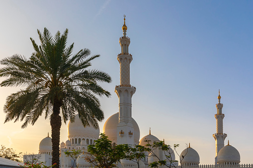 ABU DHABI, UAE - April 18, 2022: Sheikh Zayed Grand Mosque at dusk