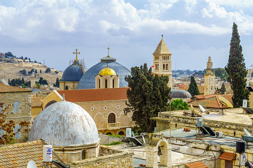 Jerusalem, Israel - November 20, 2021: Rooftop view of the Church of the Holy Sepulcher and other monuments, in the Old City of Jerusalem, Israel