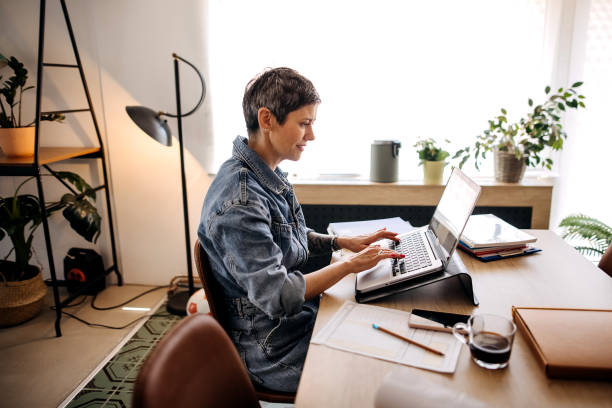 istock Getting her home business up and running 1396082416