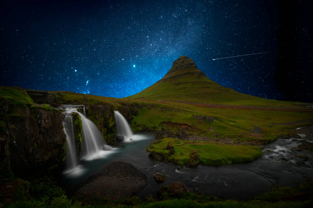 istock Colorful waterfall with milky way 1396084190