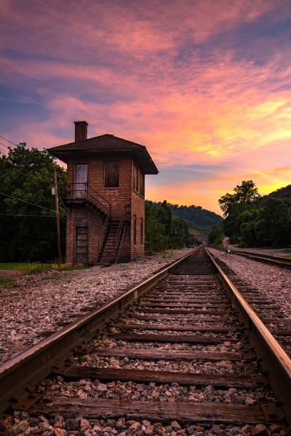 Dramatic summer sky over railroad track stock photo