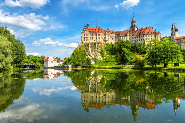 Panorama of Danube river and Sigmaringen Castle, Schwarzwald, Germany. It is landmark of Baden-Wurttemberg. Landscape with Hohenzollern castle in summer, scenic view of Gothic mansion in Swabian Alps