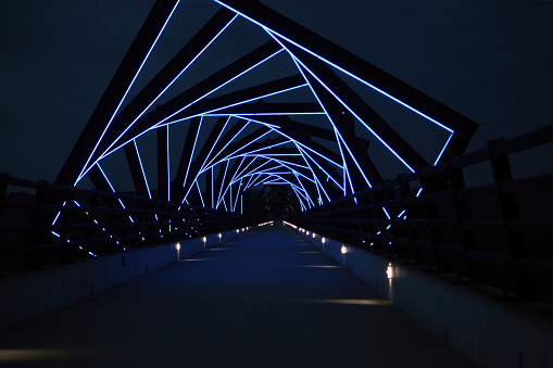 High above the Des Moines River, the trestle portion of Iowa's High Trestle Trail lights up each night when the sun sets and darkness falls.