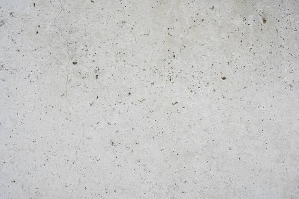 istock grey concrete wall, grunge abstract background with copy 1396092942