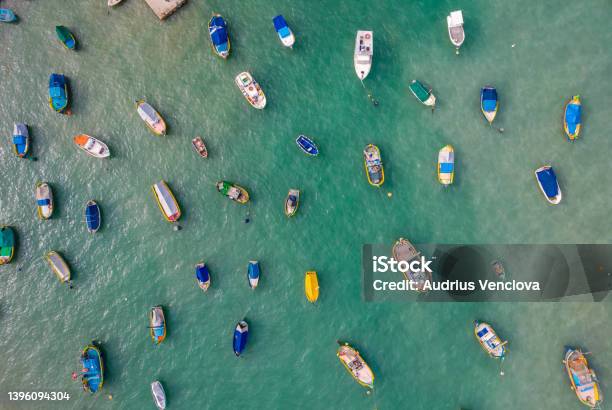 Aerial View Of The Colorful Fisherman Boats In Marsaxlokk Malta Stock Photo - Download Image Now