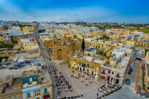 Aerial view of Santwarju tal-Madonna ta Pompei in Marsaxlokk fisherman village in Malta island