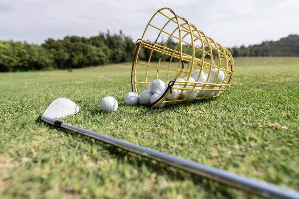 istock Low-angle vision of a golf ball on the grass 1396098449